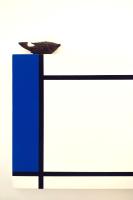 a bird sitting on top of a blue object at Vejerísimo Casa Boutique in Vejer de la Frontera