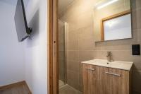 a bathroom with a sink and a shower at Résidence LES TERRASSES DE LA VANOISE - Appartement LES TERRASSES DE LA VAN 924 in Champagny-en-Vanoise