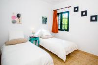 Postel nebo postele na pokoji v ubytování Sunny Golf Villas