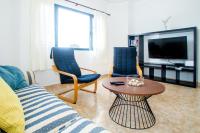 TV a/nebo společenská místnost v ubytování Sunny Golf Villas
