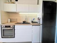 Kuchnia lub aneks kuchenny w obiekcie Résidence Le Cezelly - 2 Pièces cabine 5 couchages PORT LEUCATE. Réf: 4CEZ_6C MAE-6634