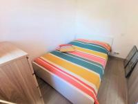 Łóżko lub łóżka w pokoju w obiekcie Résidence Le Cezelly - 2 Pièces cabine 5 couchages PORT LEUCATE. Réf: 4CEZ_6C MAE-6634
