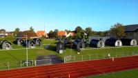 a view of a stadium with a race track and domes at Danhostel Maribo in Maribo