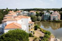 an aerial view of a resort with a river at Résidence Port Bourgenay - maeva Home - Appartement 3 Pièces 7 Personnes - 714 in Talmont