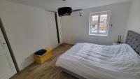Cama ou camas em um quarto em Appartement neuf avec terrasse