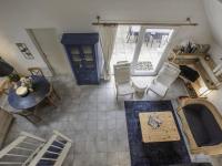 an overhead view of a living room with a table and chairs at Villa Campagne 138 in Daumazan-sur-Arize