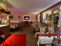 Μια τηλεόραση ή/και κέντρο ψυχαγωγίας στο Harmonie Hotel Rust