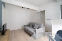 Een zitgedeelte bij Charming apartment for 2 in the heart of Paris - Welkeys