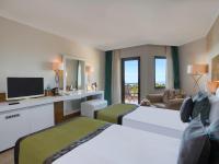 Postel nebo postele na pokoji v ubytování Asteria Family Resort Belek