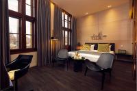 Een bed of bedden in een kamer bij art'otel amsterdam, Powered by Radisson Hotels