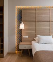 Postel nebo postele na pokoji v ubytování Hotel Tamaris