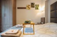 Posteľ alebo postele v izbe v ubytovaní Lef Apartment
