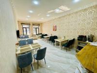 Samarkand Travelにあるレストランまたは飲食店
