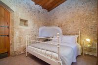 Postel nebo postele na pokoji v ubytování Villa Salis