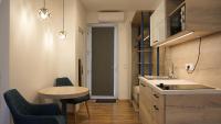 A kitchen or kitchenette at Napsugár Club és Panzió