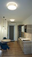 A kitchen or kitchenette at Napsugár Club és Panzió
