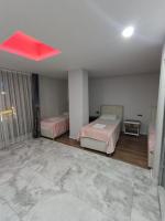 Postel nebo postele na pokoji v ubytování Dara Otel