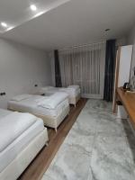 Postel nebo postele na pokoji v ubytování Dara Otel