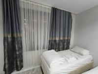 Postel nebo postele na pokoji v ubytování Dara Otel