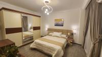 Postel nebo postele na pokoji v ubytování Madinaty apartment 1 شقة فندقية مفروشة سوبر لوكس في مدينتي