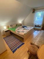 A bed or beds in a room at Privat Greta