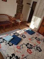 A bed or beds in a room at Privat Greta