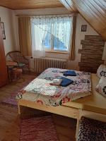A bed or beds in a room at Privat Greta