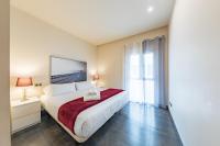 A bed or beds in a room at Cituspace Sandoval