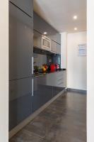 A kitchen or kitchenette at Cituspace Sandoval