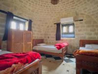 Postel nebo postele na pokoji v ubytování Zad Elmosafer Villa - Tunis Village