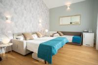 Posteľ alebo postele v izbe v ubytovaní B&B Villa Rosa