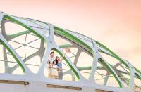 a family standing on top of a metal structure at Vinpearl Resort & Spa Phu Quoc in Phú Quốc