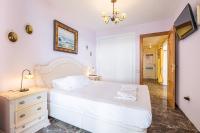 A bed or beds in a room at Benibeach 3-2-B Apartment Poniente Beach