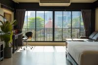 NORN Riverside Bangkok Hotel - นอนริมน้ำにあるベッド