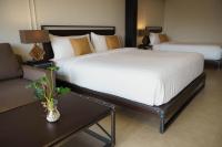 NORN Riverside Bangkok Hotel - นอนริมน้ำにあるベッド