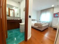 A bed or beds in a room at YourHome in Vico