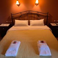 Łóżko lub łóżka w pokoju w obiekcie Guesthouse Kastania Korakis