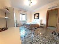 A bed or beds in a room at YourHome in Vico