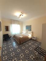 A bed or beds in a room at YourHome in Vico