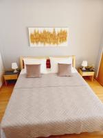 Ein Bett oder Betten in einem Zimmer der Unterkunft Apartments Kova&#x10D;i&#x107;