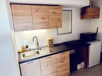Kuchyň nebo kuchyňský kout v ubytování Moon Bay apartment - Free large parking