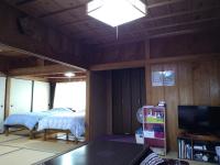 Cottage Yakusugi Houseにあるベッド