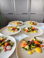 un grupo de platos de comida sobre una mesa en Boutique Beach House, Colina del Emperador, en La Manga del Mar Menor