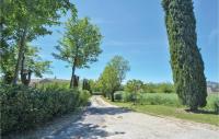 a dirt road with trees on both sides at Amazing Home In Barjac With 3 Bedrooms, Wifi And Outdoor Swimming Pool in Barjac