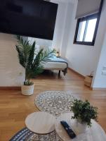 Telewizja i/lub zestaw kina domowego w obiekcie My Suites Madrid - Aeropuerto Ifema