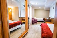A bed or beds in a room at Hotel Alda Bonaval
