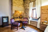 A bed or beds in a room at Hotel Alda Bonaval