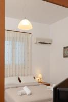 Posteľ alebo postele v izbe v ubytovaní ALBATROS SUITE STEGNA BEACH