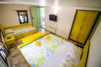 Postel nebo postele na pokoji v ubytování Стальовата Къща - Stalyovata House
