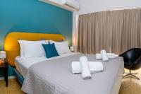 Posteľ alebo postele v izbe v ubytovaní Crown Syntagma Apartment